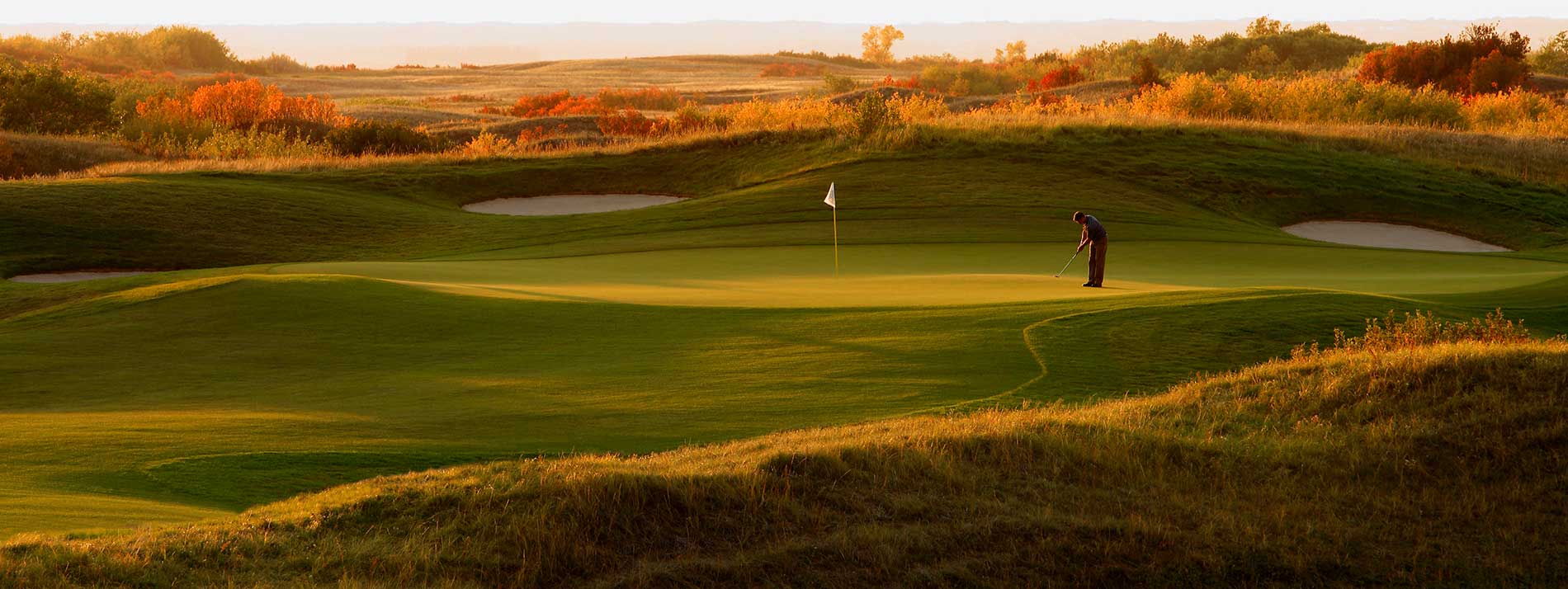 golfer at course in early evening